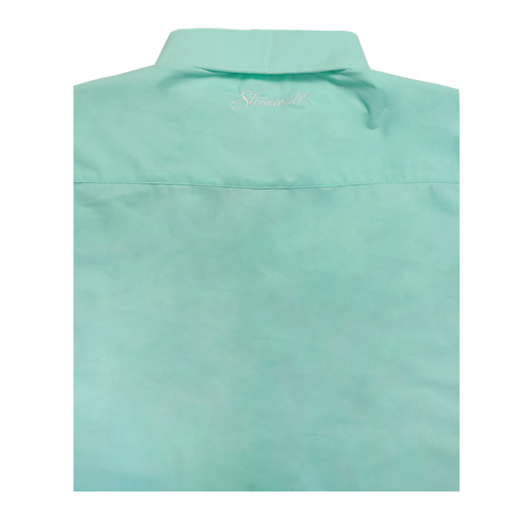 A sea-foam green collared shirt shown from the back, featuring a stitched seam across the upper back and a small cursive 'Stuart Mill' logo embroidered near the collar.